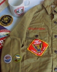 Merit Badges are worn close to the end of the right arm