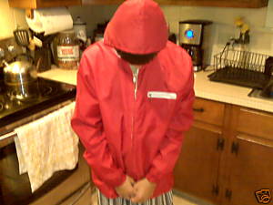 Red nylon jacket with hood shown